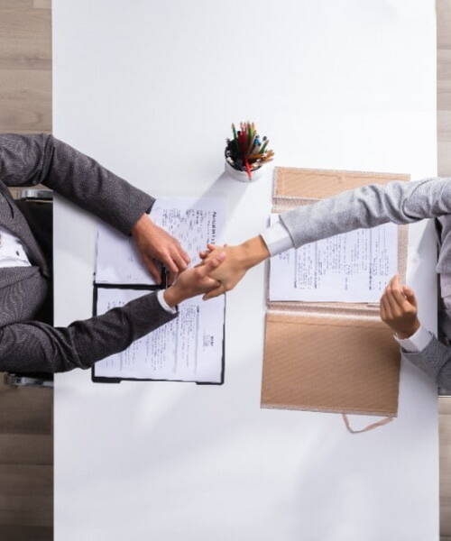 shaking hands accepting job offer
